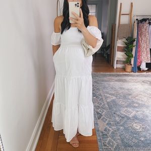 White smocked maxi dress with flutter sleeves